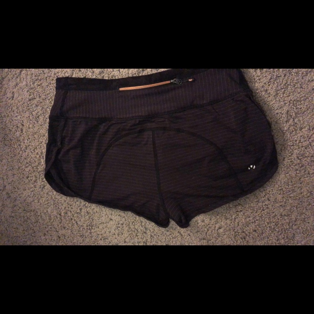 Lulu lemon black with (light gold) stripes shorts